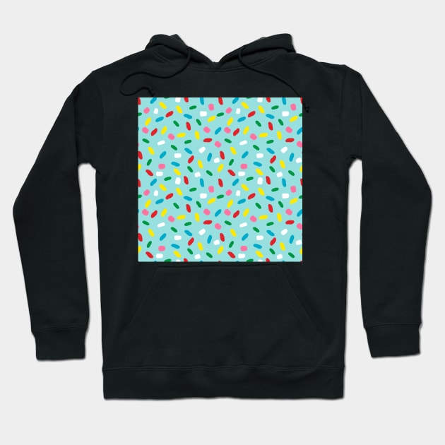 Colorful sprinkles on blue melting icing Hoodie by marufemia